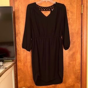 Black dress with v neck 3/4 sleeve and pretty back detail